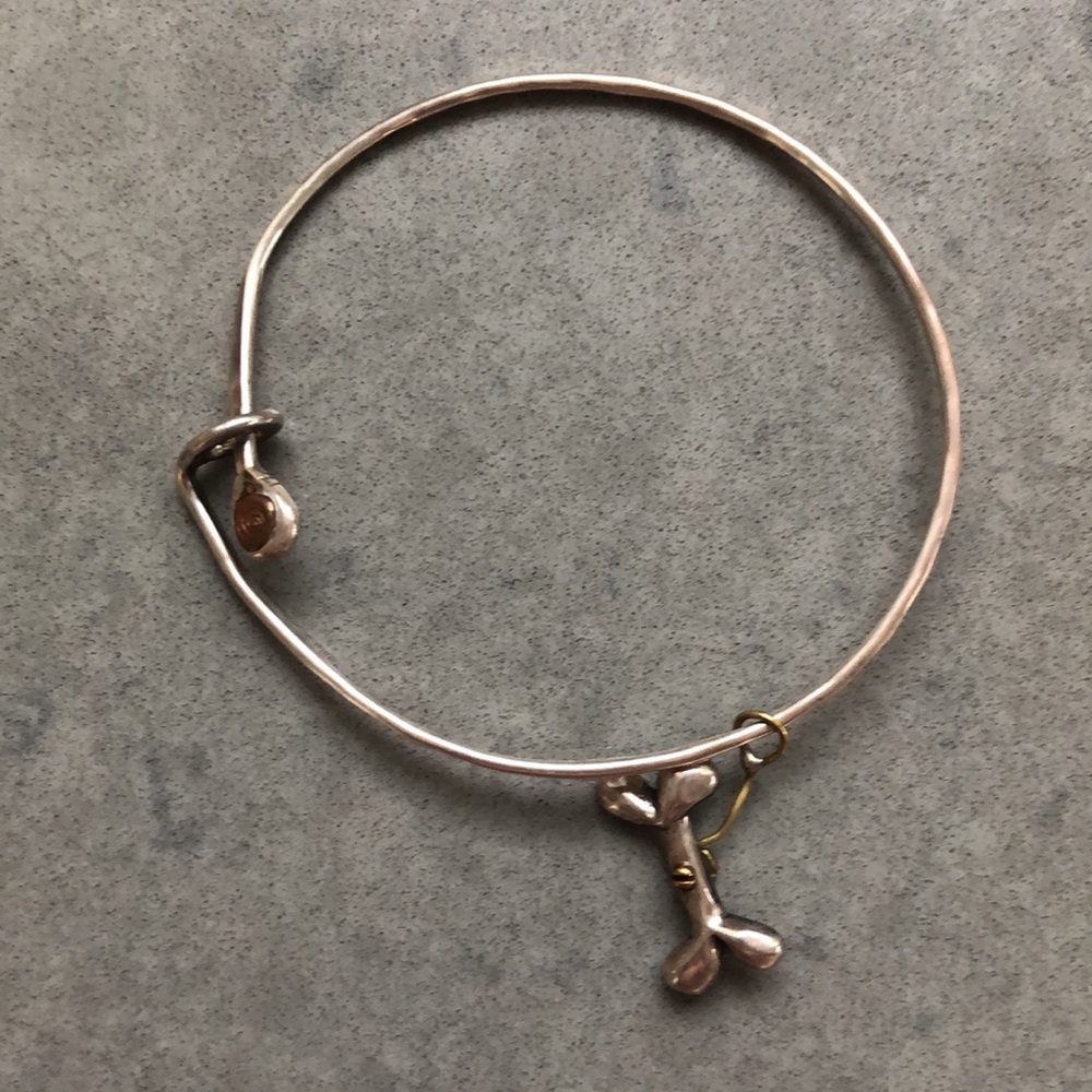 Sterling Silver bangle & dog bone charm on like new condition!